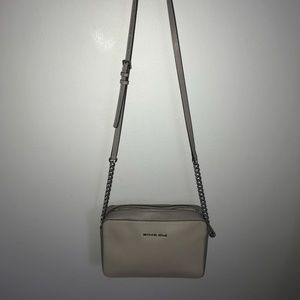 LIKE NEW grey micheal kors cross body purse